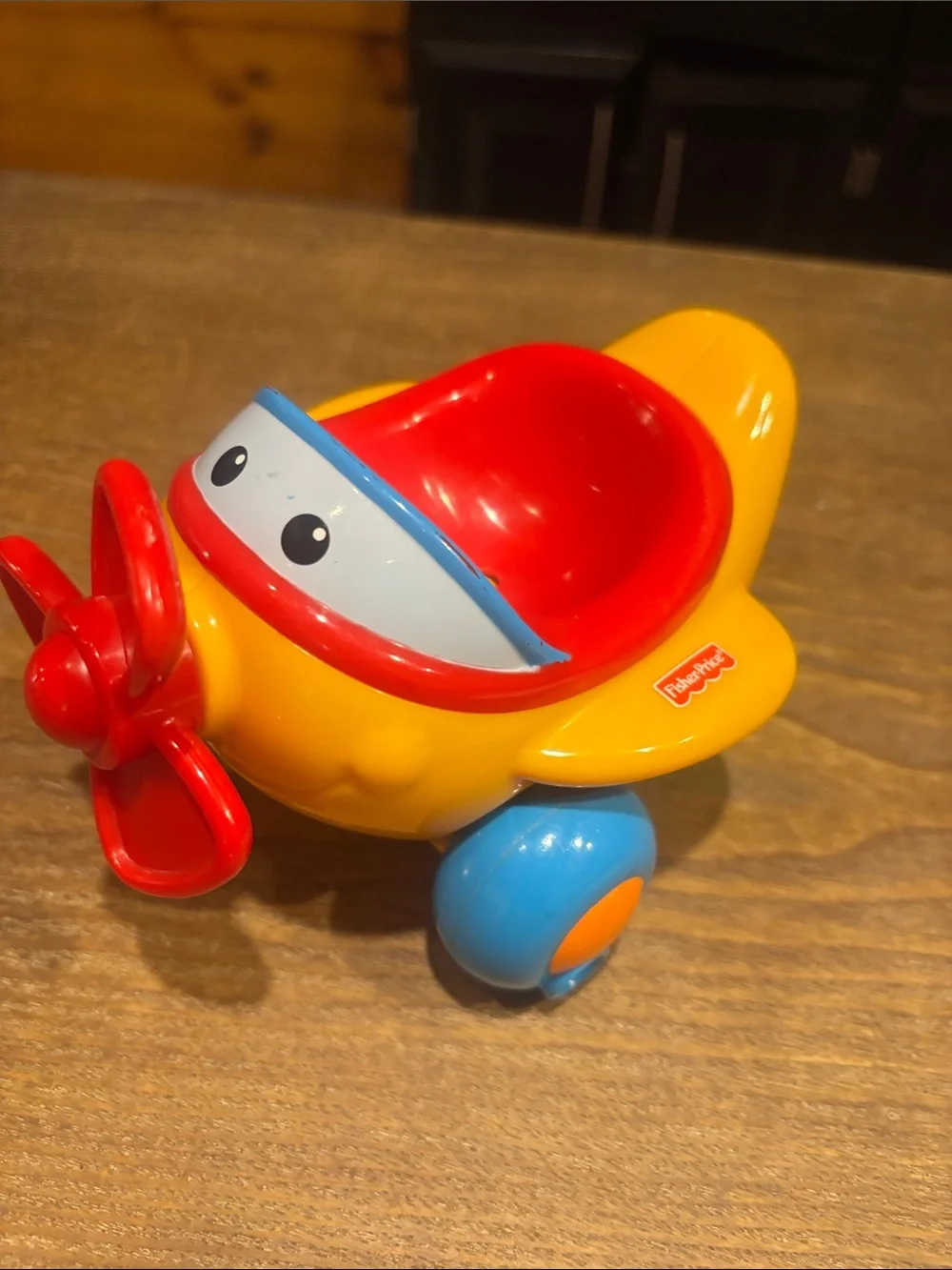 Fisher-Price Bright Yellow and Red Toddler Push Airplane with Blue Wheels